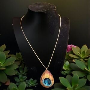 Elegant Gold and Blue Peacock Pendant Necklace